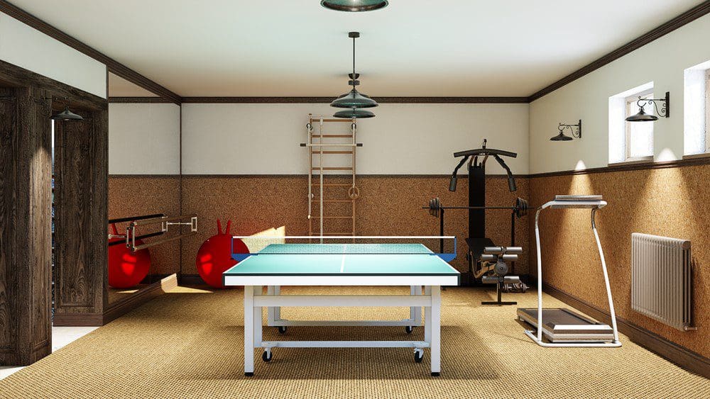 Home,Gym,In,The,Basement,With,Fitness,Equipment,And,Table home gym basement conversion